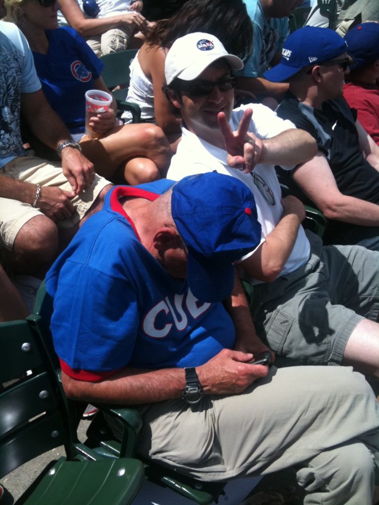 Dad Asleep at a Cubs Game with Daniel's Support